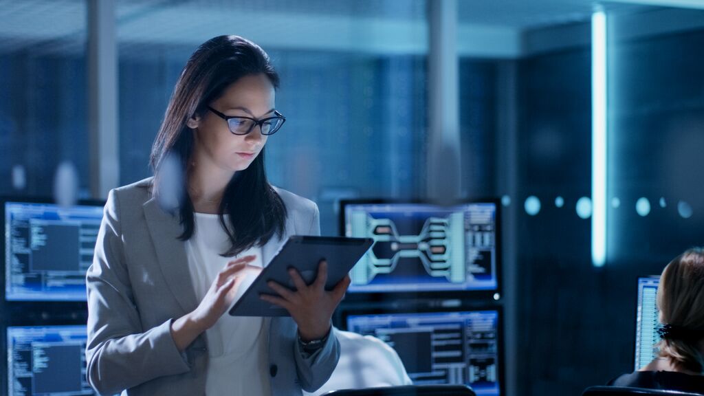 Business woman working on tablet