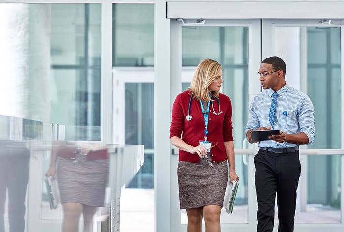 NHS doctor discussing information