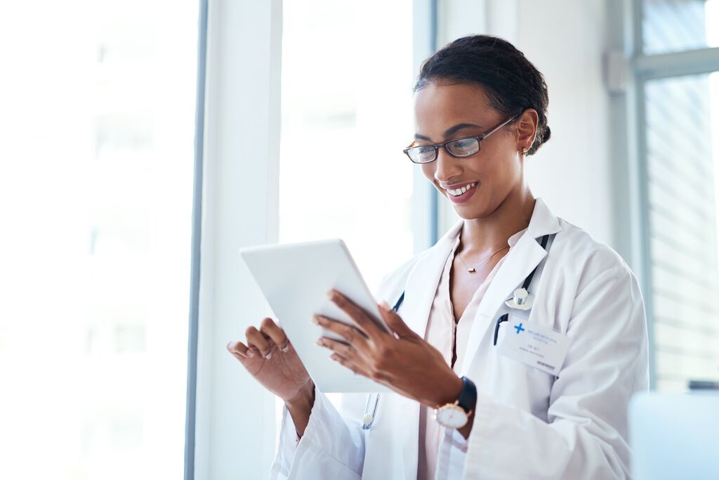 Happy doctor reading results